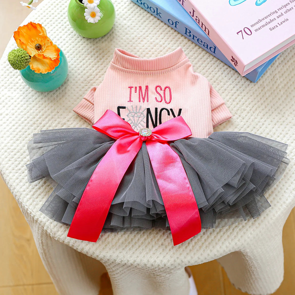 Yellow fancy bowtie pet dress for dogs, I YAN brand, featuring a one-piece formal summer outfit for small dogs and puppies.