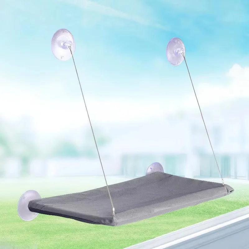 Winter cat window hanging hammock bed by I YAN with suction cups, space-saving pet bed for all seasons, easy to install.