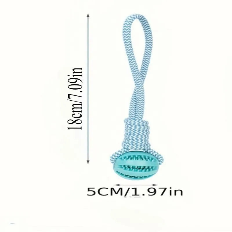 Durable cotton rope and rubber dog chew ball with treat dispenser, 18x13cm, ideal for teething and boredom relief.