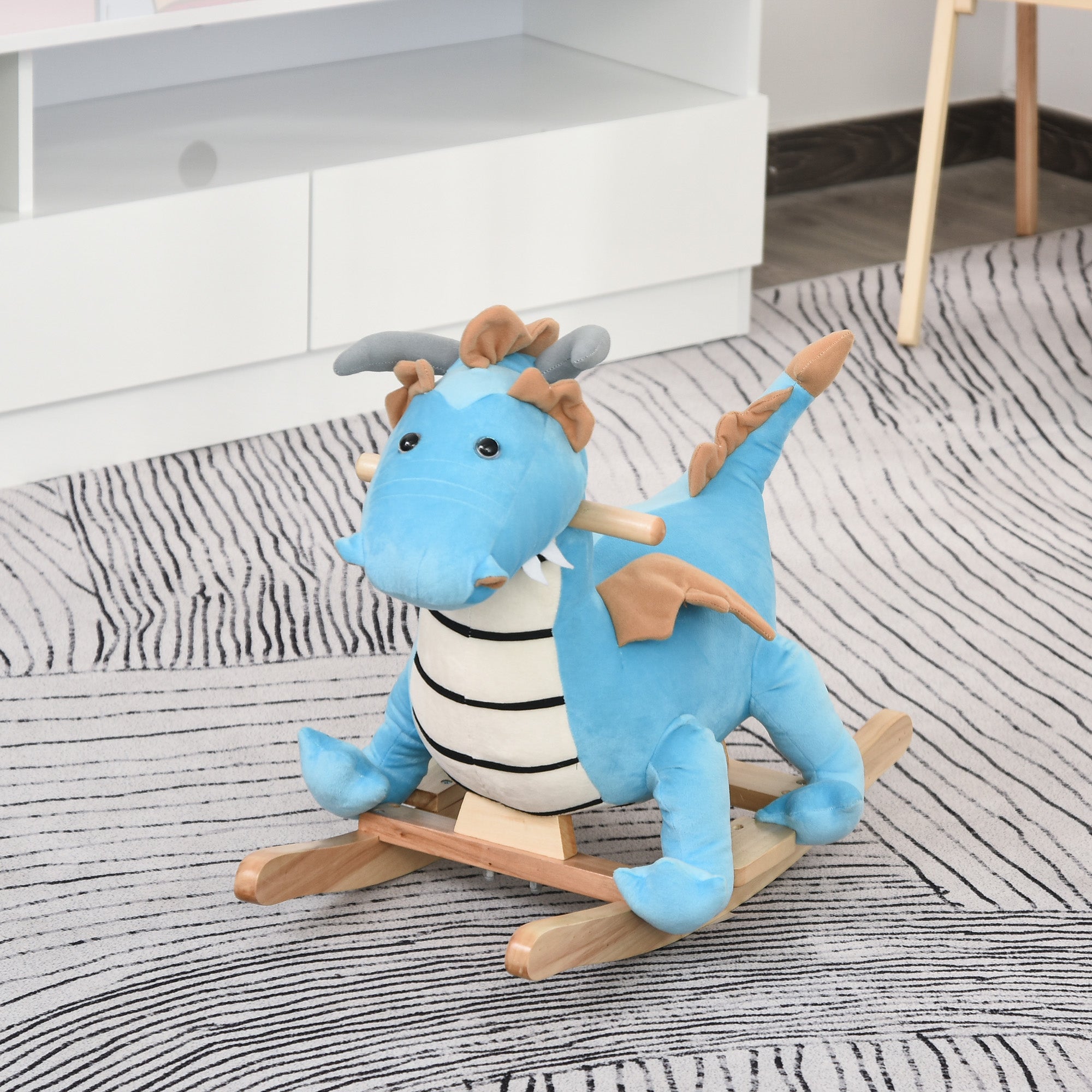 Blue wooden dinosaur rocking horse for children, featuring realistic sounds and prehistoric design, suitable for ages 18-36 months.