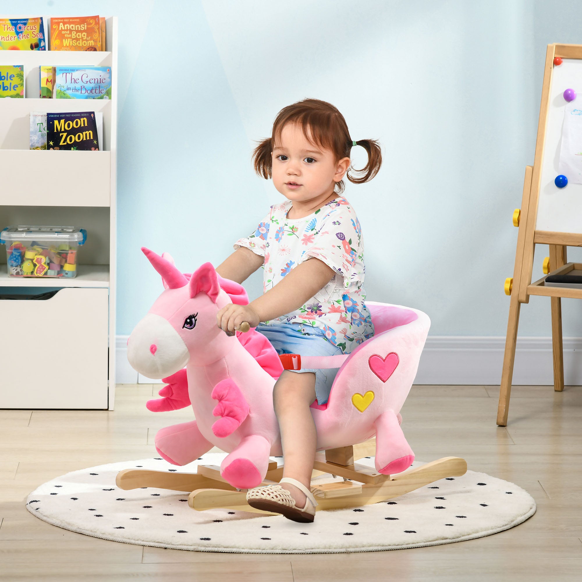Pink baby rocking horse unicorn by I YAN with seatbelt and 32 songs, designed for young children to ride and play.
