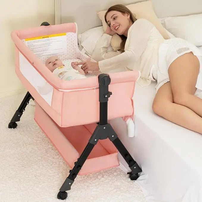 Portable 3-in-1 Baby Bassinet Bedside Sleeper by I YAN, easy to assemble and fold, suitable for newborns, lightweight and foldable design.