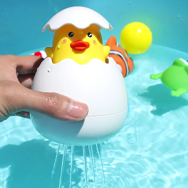 Baby bath toy featuring a cute duck and penguin water spray sprinkler by I YAN, ideal for entertaining kids during bath time