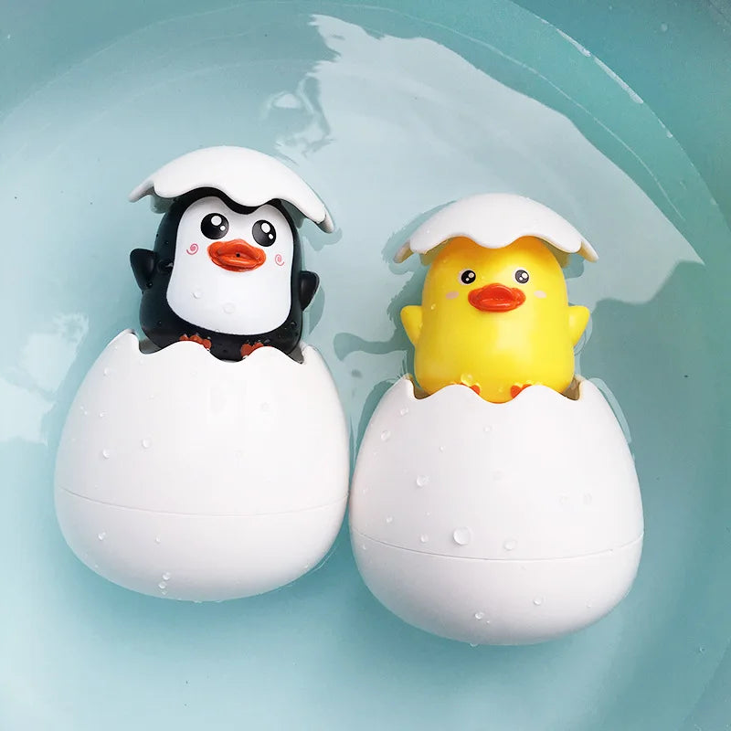 Cute duck and penguin baby bath toy water spray sprinkler by I YAN, designed for kids' bath time fun