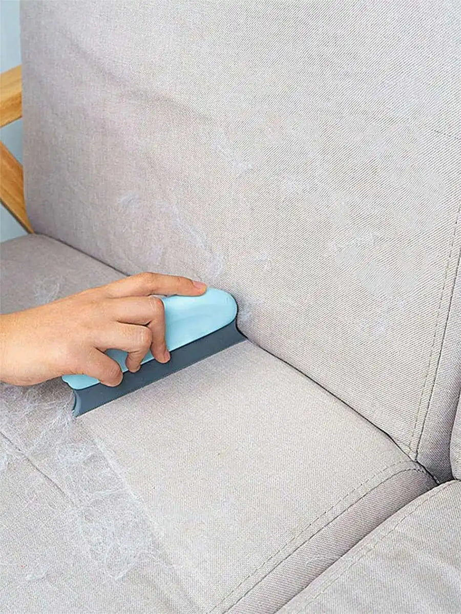 PetHair Remover Brush by I YAN with handle, for removing cat and dog hair from furniture, cars, and clothing.