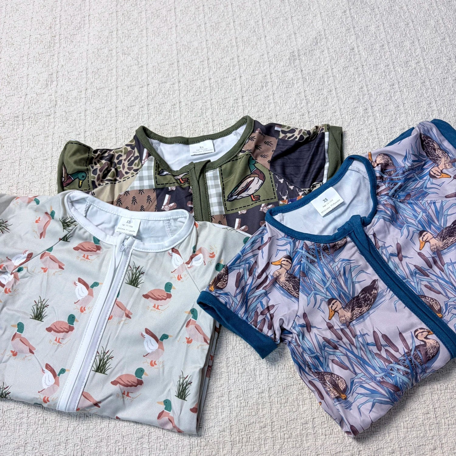 Baby boy summer zipper romper with short sleeves and duck design, comfortable toddler outfit from I YAN.