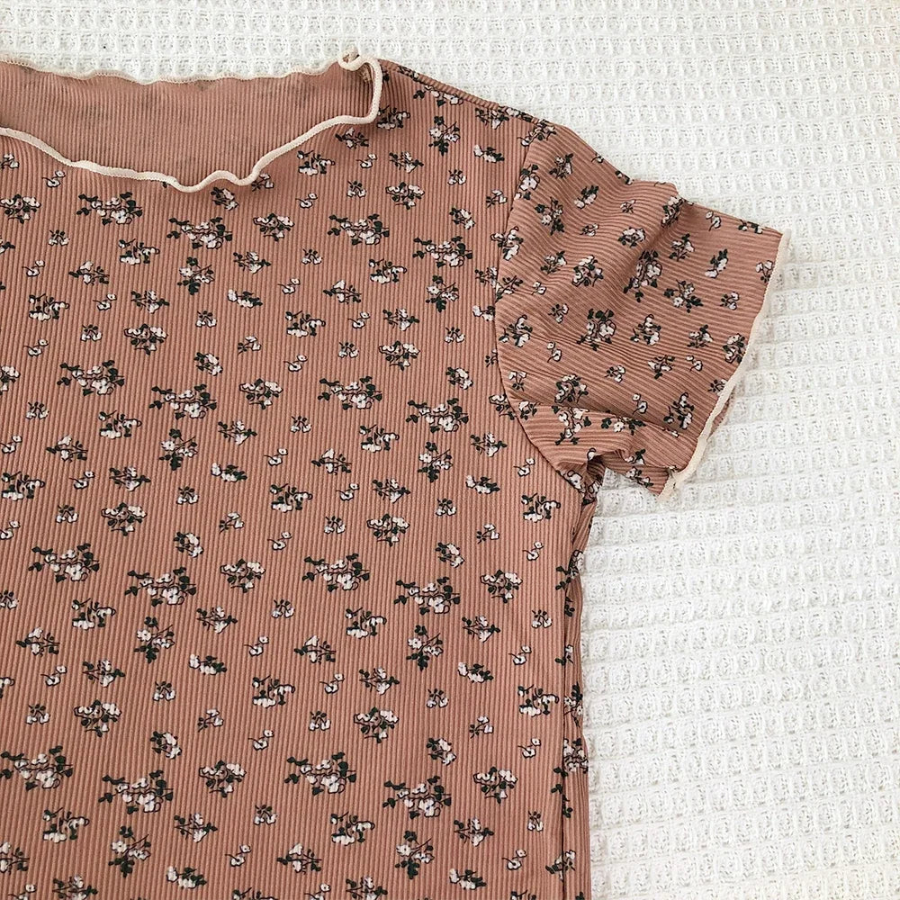 Kids summer casual outfit by I YAN featuring a flower-printed short sleeve round neck T-shirt and matching pants set.