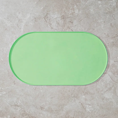 Non-slip waterproof silicone pet feeding mat for cats and dogs, featuring a flexible, easy-to-clean design by I YAN.