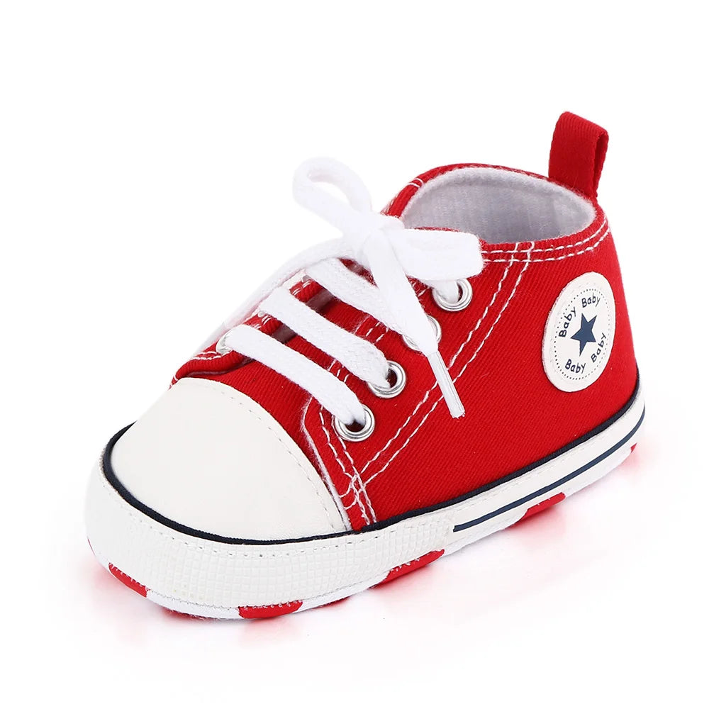 I YAN baby canvas sneakers for boys and girls with soft soles, non-slip design, ideal for first walkers and toddlers.