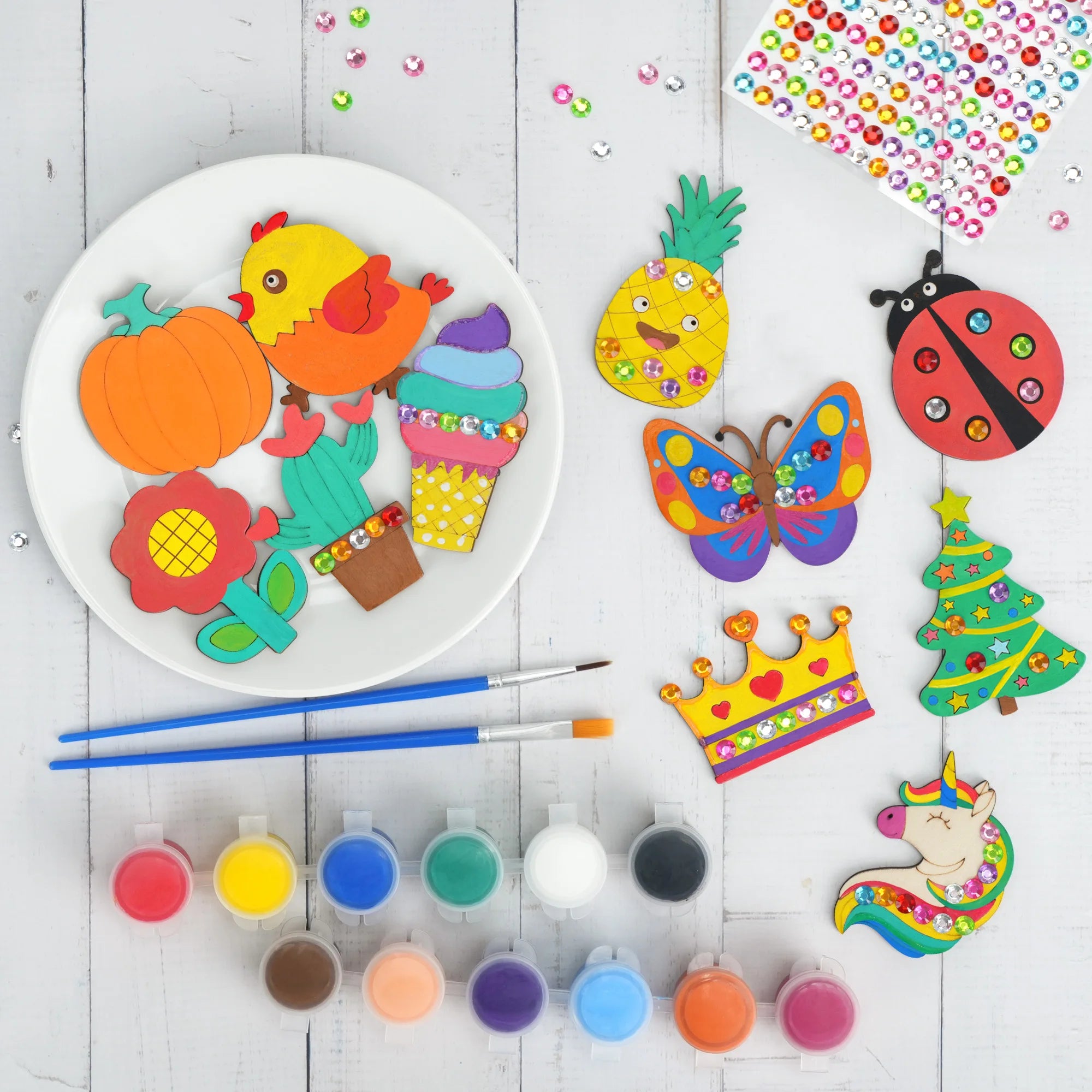 DIY wooden magnet kit by I YAN featuring glow-in-the-dark paint, craft supplies, and fun holiday party favors for kids.
