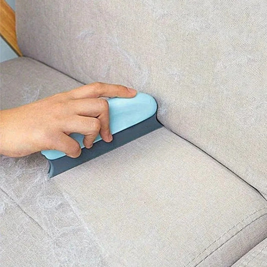 I YAN pet hair cleaning brush with ergonomic handle, removing dog and cat fur from furniture, carpets, clothes, and car seats.