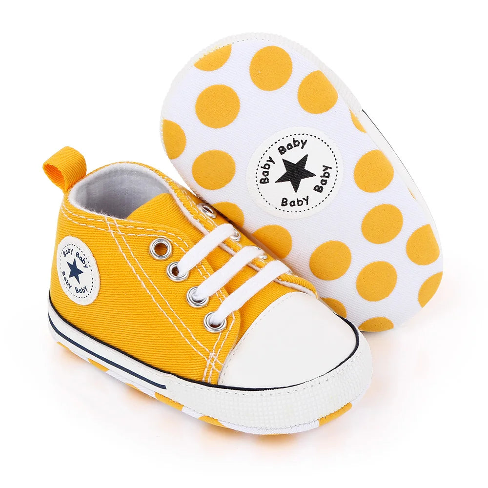I YAN baby canvas sneakers for boys and girls, soft sole, non-slip toddler shoes for first steps, casual walking footwear.