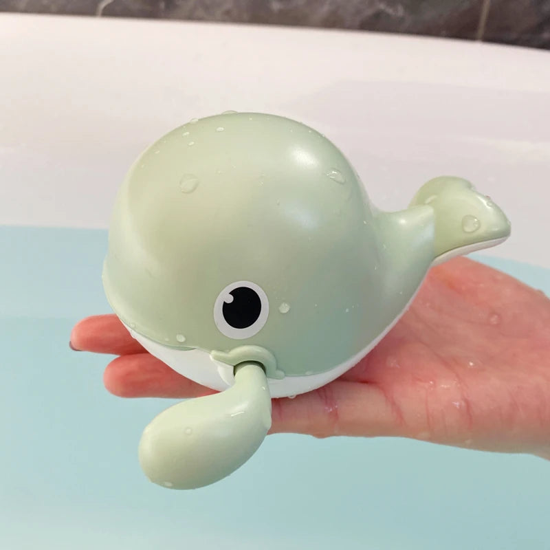 Baby bath toy featuring a cute duck and penguin water spray sprinkler for kids, designed by I YAN.