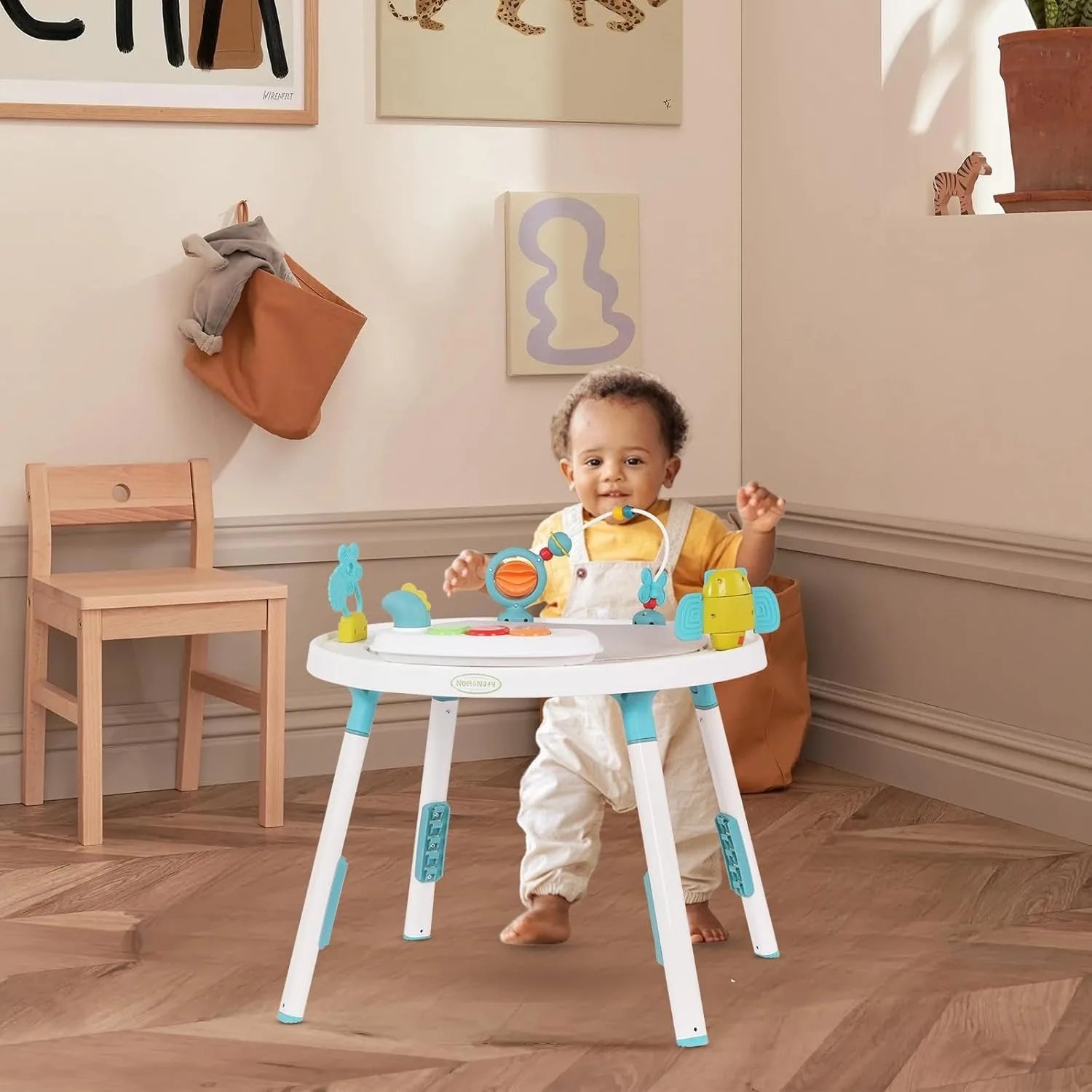 Baby activity center by I YAN with detachable toys and a rotating seat, designed for toddler development and entertainment.