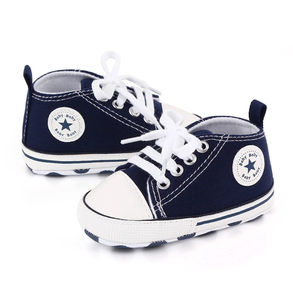I YAN spring baby shoes for boys and girls, classic canvas sneakers with soft soles and non-slip design for first walking toddlers.