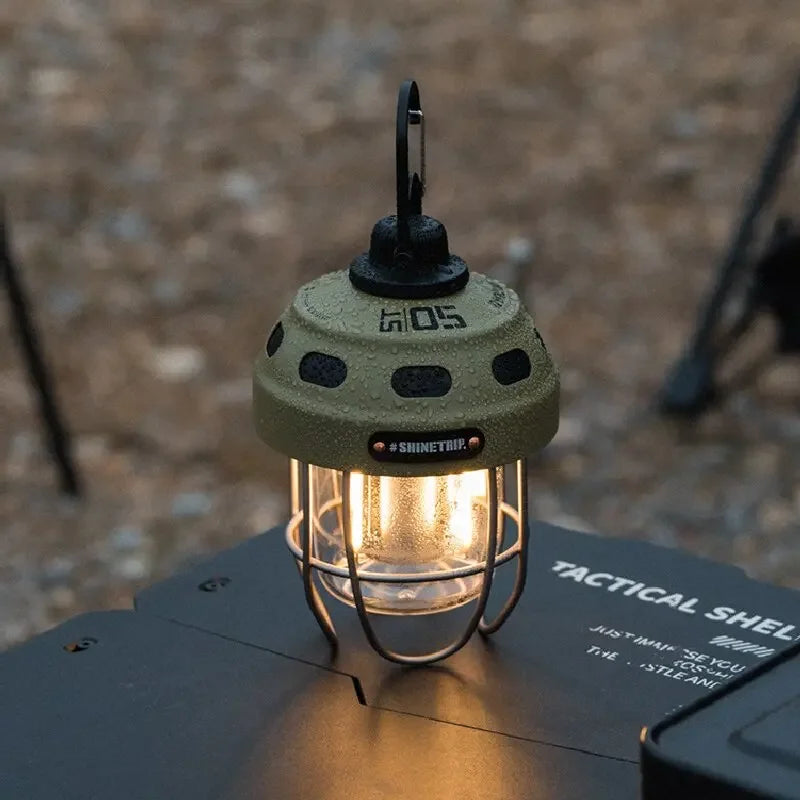 Outdoor vintage pendant light by I YAN with ultra-long life, portable rechargeable camping lantern for tents and ambient lighting.