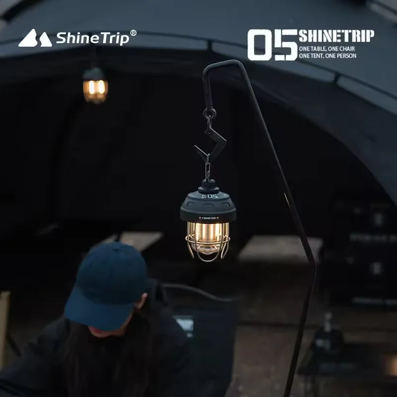 Outdoor vintage pendant light by I YAN featuring portable rechargeable camping lantern with ambient glow for tents and outdoor use.