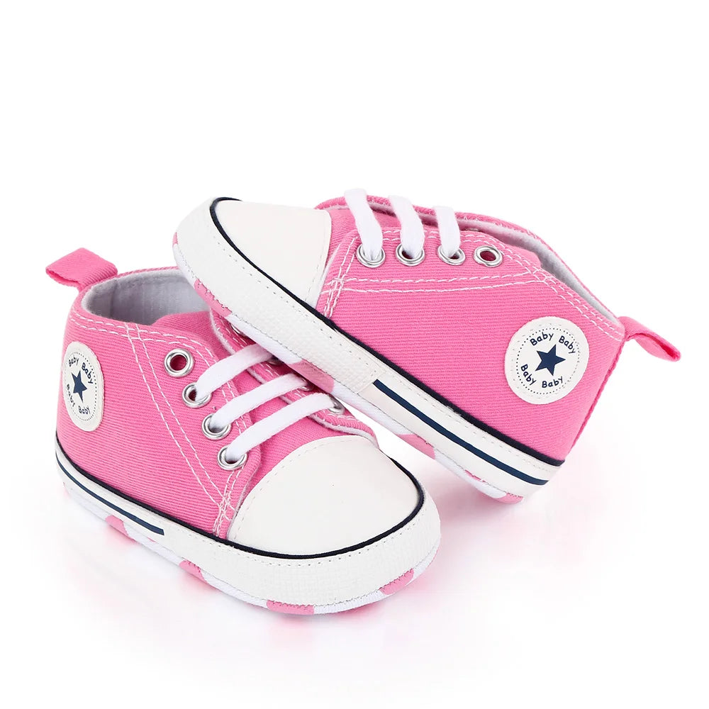I YAN baby canvas sneakers for boys and girls with soft soles, non-slip design, ideal for newborns and toddlers learning to walk.