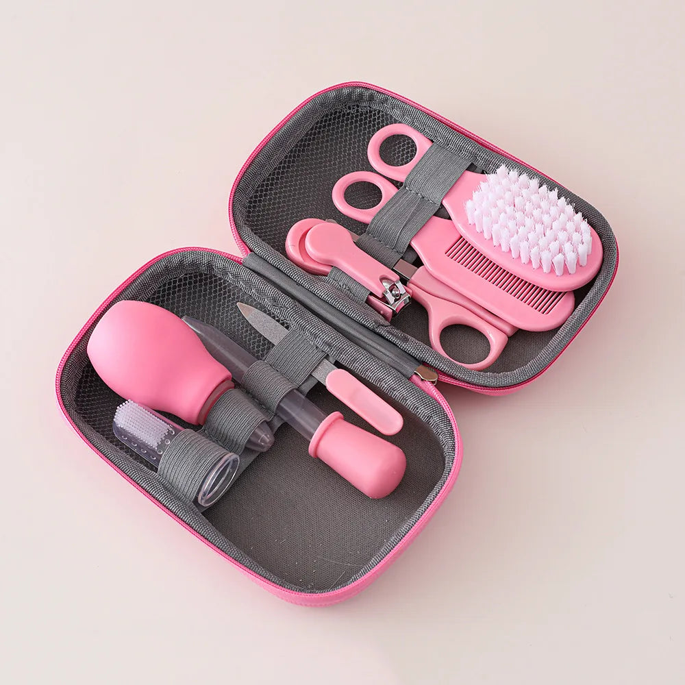 I YAN 8-piece baby grooming kit with hairbrush, comb, nail clippers, scissors, toothbrush, and nasal aspirator for newborn care.