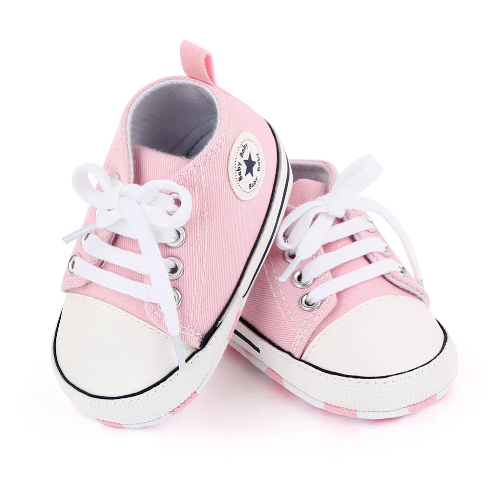 I YAN baby canvas sneakers for boys and girls with soft soles, non-slip design, ideal for first walkers and toddlers.