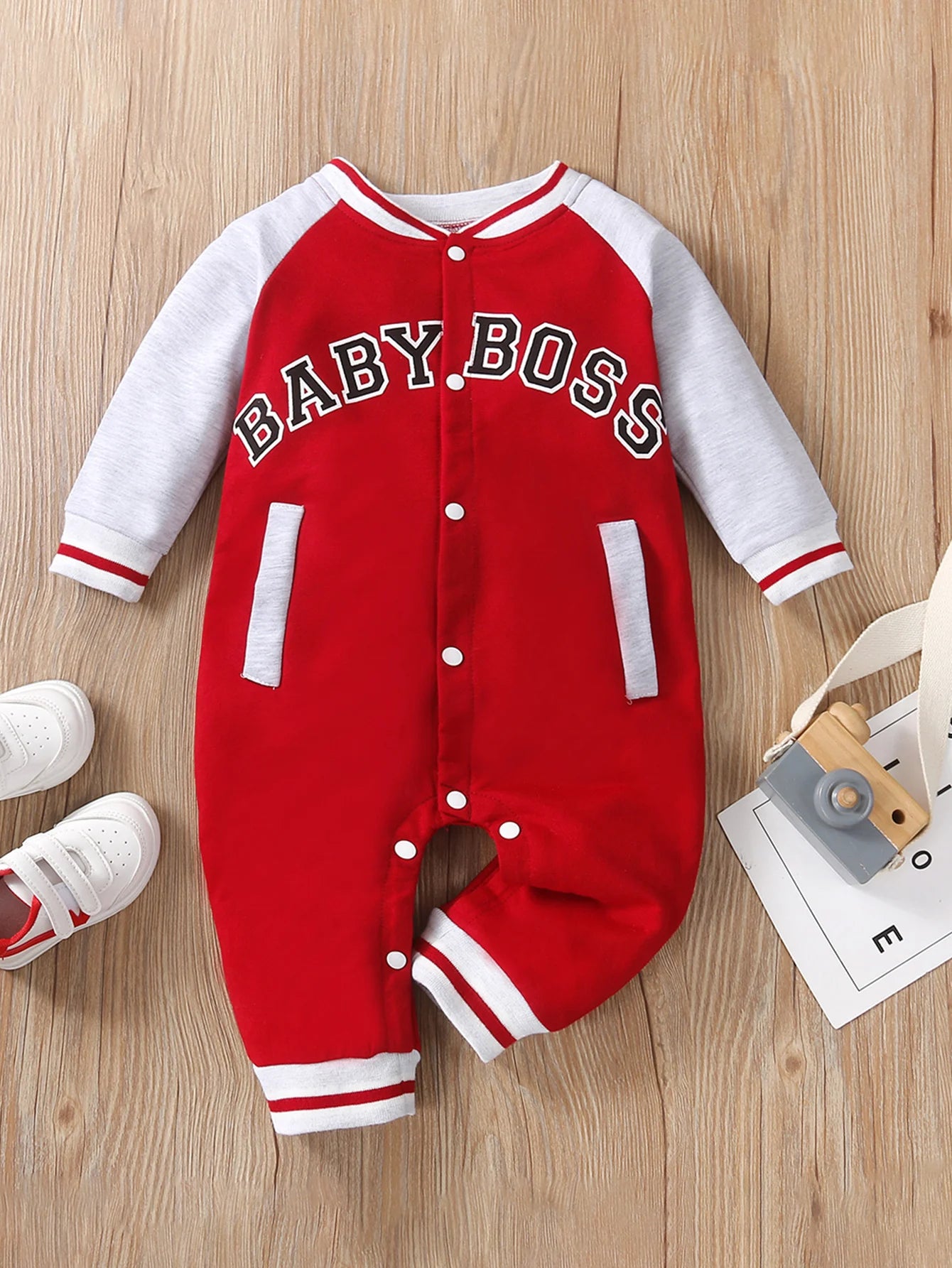 Fashionable letter printed black long sleeved round neck baby boy jumpsuit