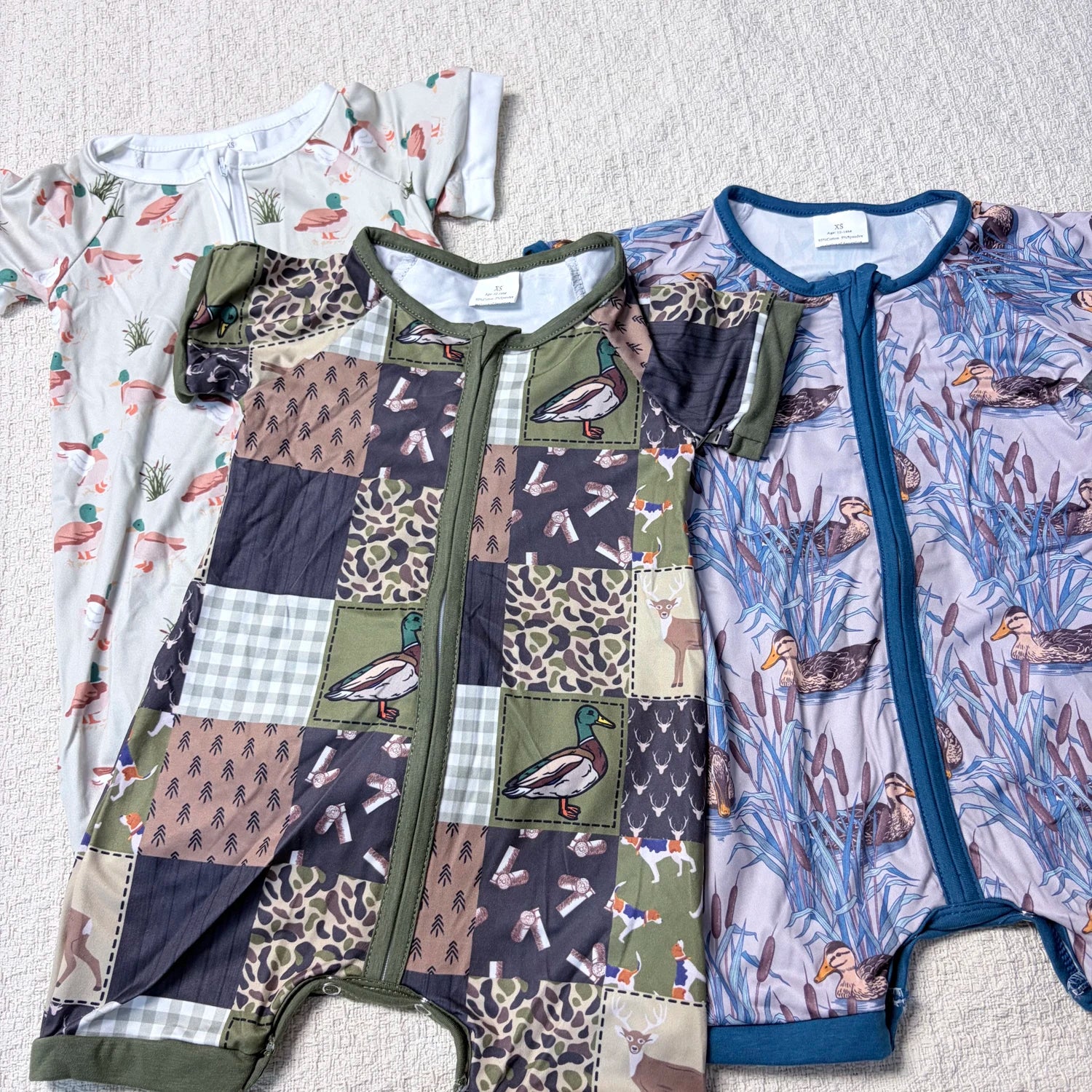 Baby boy summer zipper romper by I YAN featuring short sleeves and a duck design, perfect casual toddler outfit.