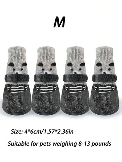 Waterproof non-slip pet socks for dogs and cats, I YAN 4-pack outdoor paw protectors with grip soles on a white background.
