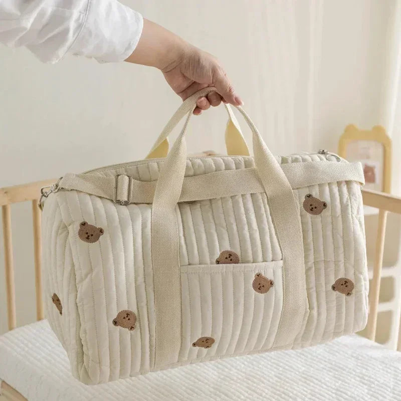 I YAN Mommy Bag Bear maternity diaper bag with stroller straps, spacious changing organizer, portable tote, and travel-friendly design.