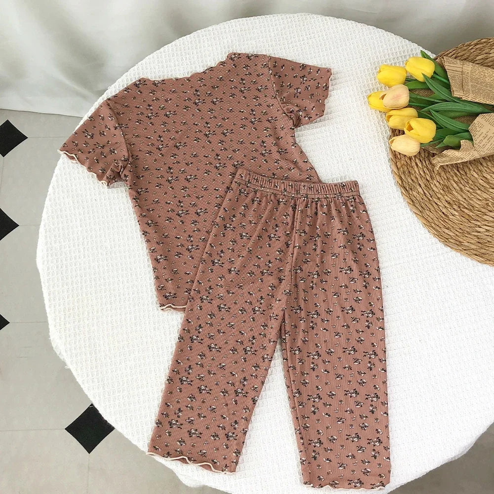 Kids' summer casual 2-piece set by I YAN, featuring a floral printed short sleeve round neck T-shirt and pants.