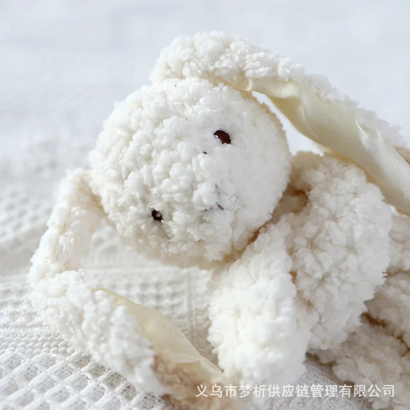 Organic cotton personalized baby burp cloth with cute rabbit embroidery and embroidered name, soft and soothing for infants.