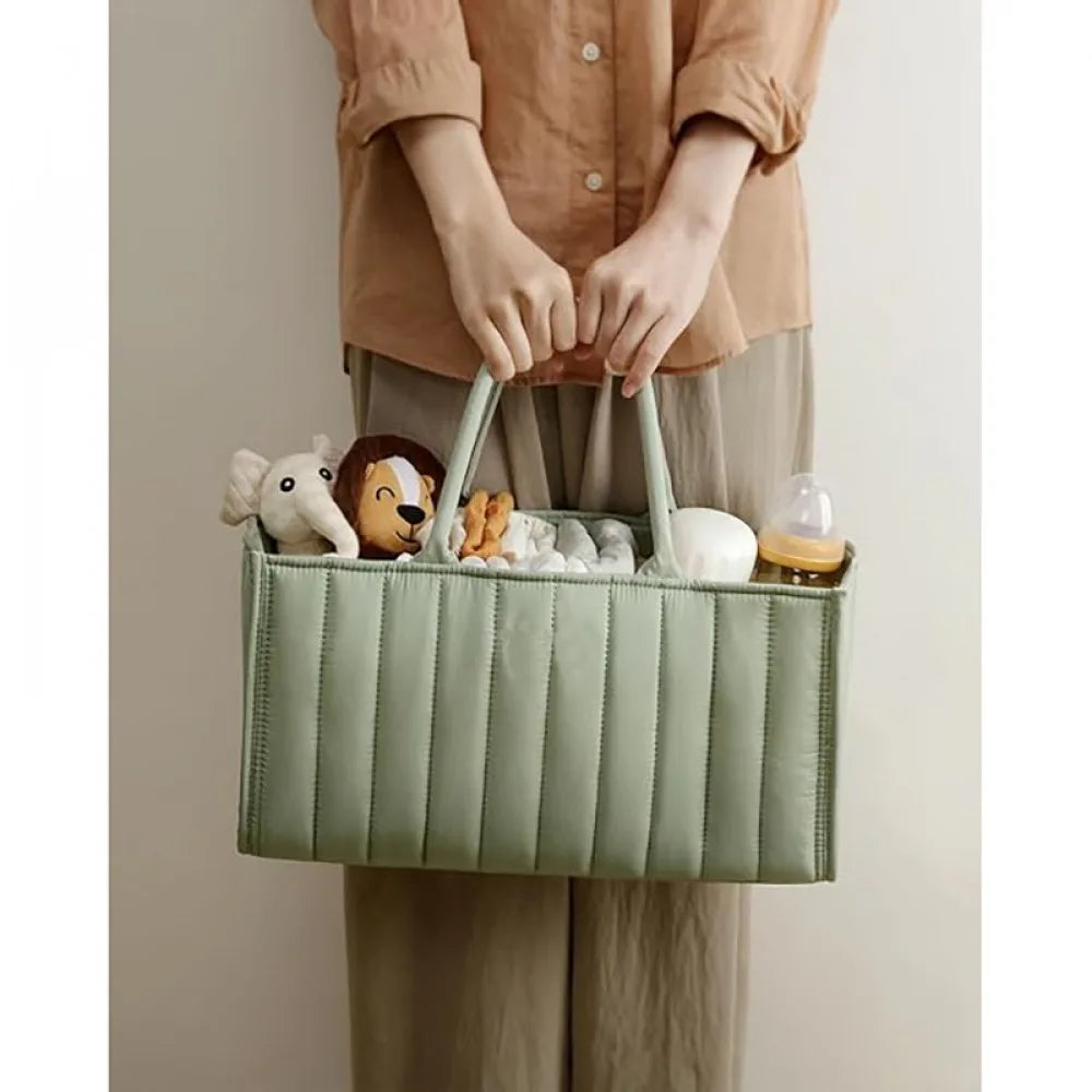 I YAN multifunctional diaper bag with foldable design, baby supplies storage, and multiple compartments for moms and babies.