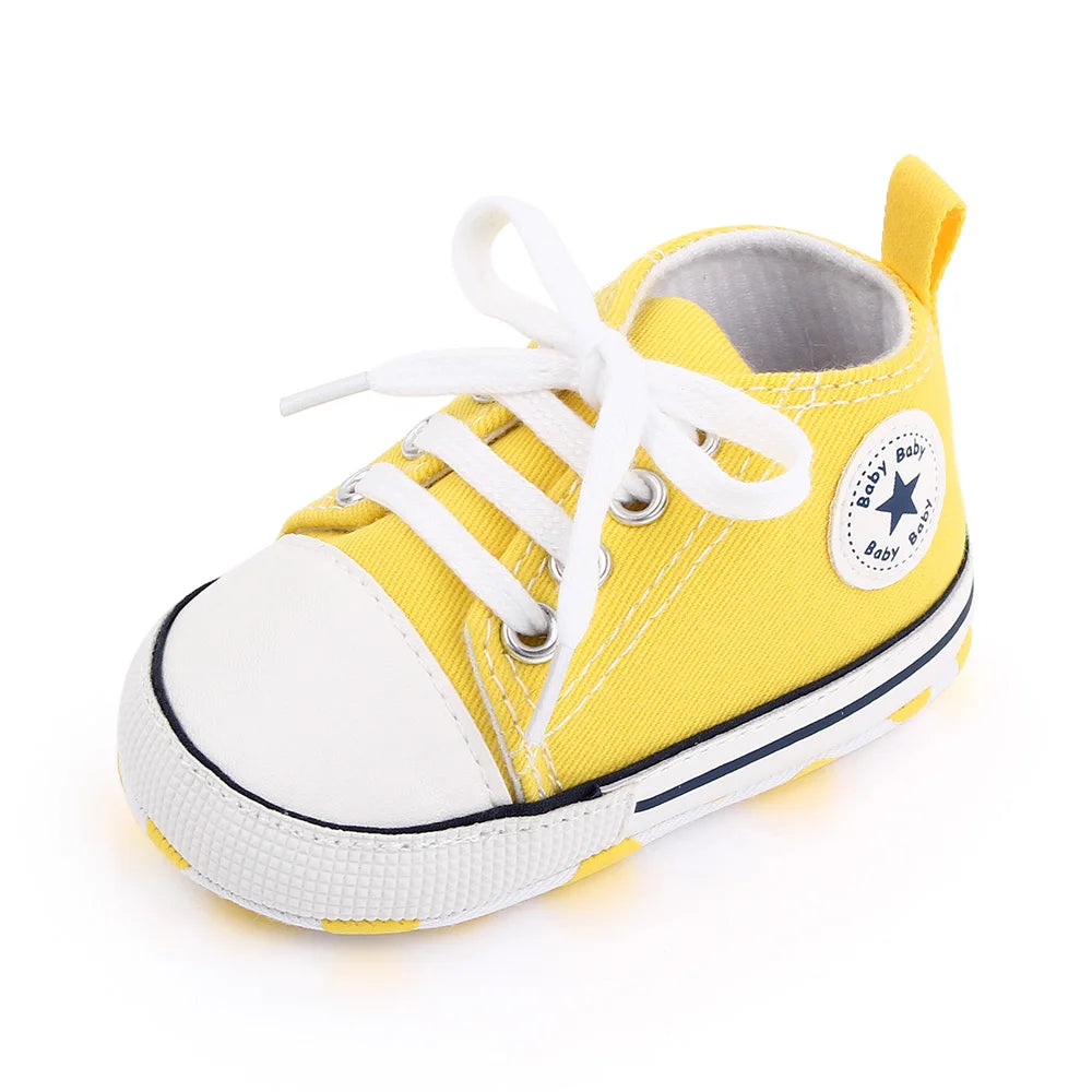 I YAN baby canvas sneakers for boys and girls with soft soles and non-slip design, ideal for toddlers and first walkers.
