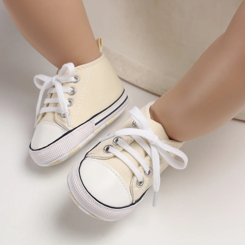 I YAN infant toddler anti-slip canvas sneakers with star design, lightweight first walkers for boys and girls, newborn and baby size.