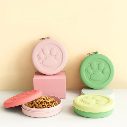Portable outdoor pet bowl by I YAN with 2-in-1 dog food and water dish, featuring a treat compartment for hiking and camping.