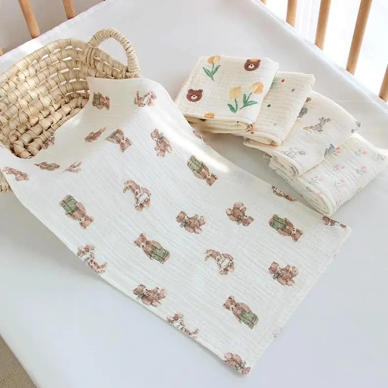 Soft cotton muslin baby face towel and burp cloth by I YAN, perfect for newborns and infants, featuring a gentle, absorbent design.