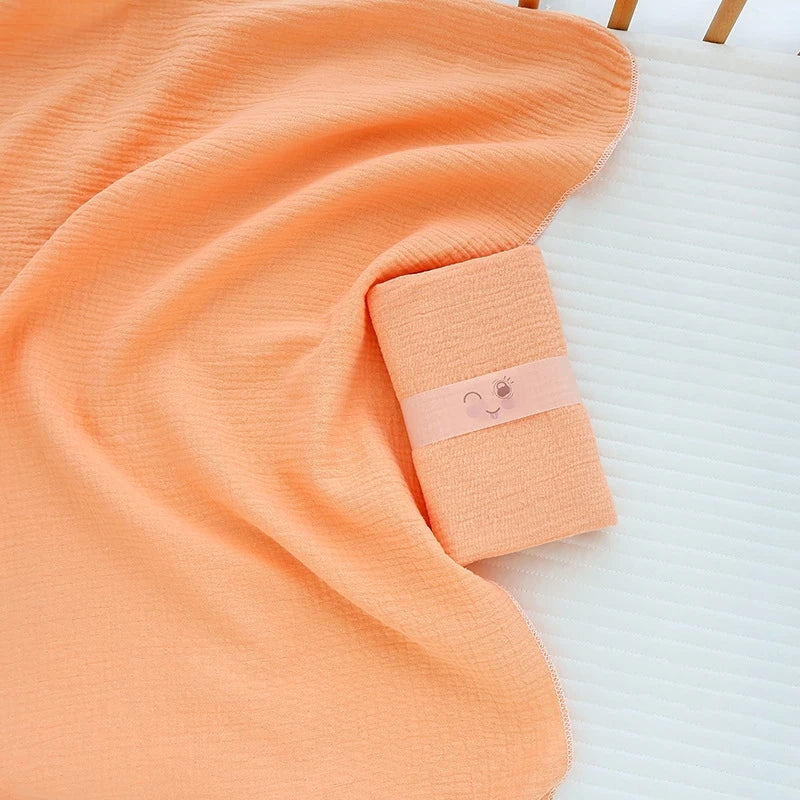 Soft cotton muslin baby swaddle blanket with cute cartoon print, breathable and gentle for newborns by I YAN.