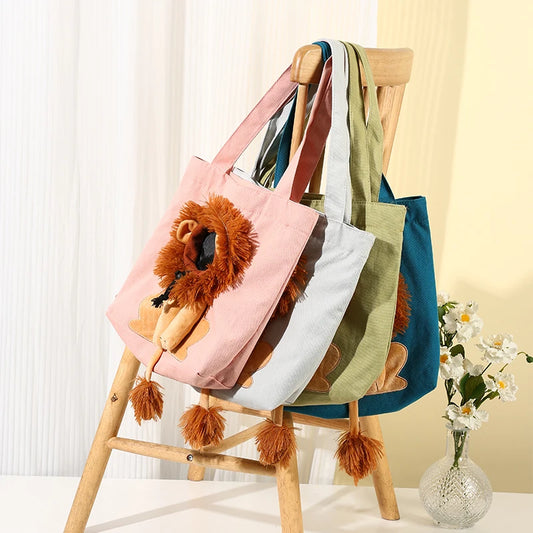 I YAN lion-shaped pet canvas shoulder bag with a cute cat carrier design, portable outdoor tote for cats and small pets.