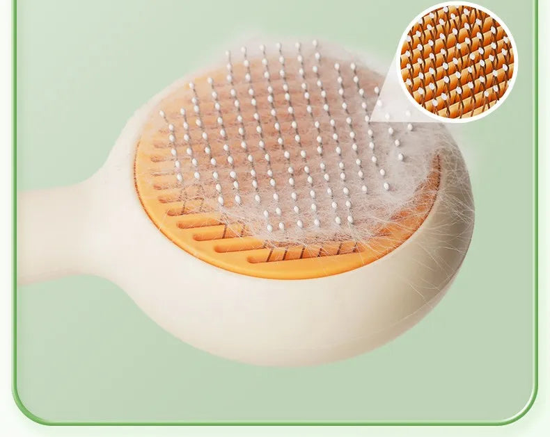 I YAN self-cleaning cat brush and pet hair remover with ergonomic handle and self-cleaning mechanism for easy grooming.