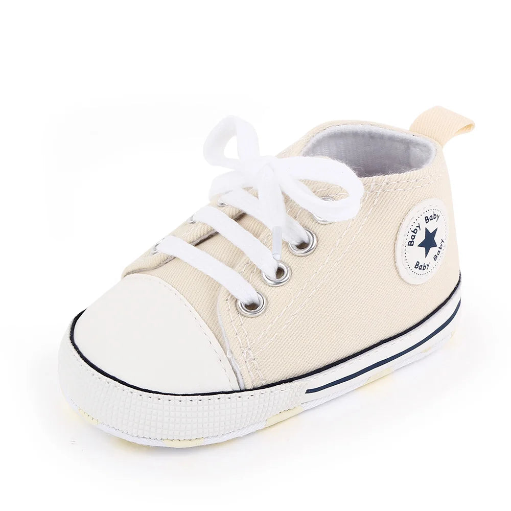 I YAN baby canvas sneakers for boys and girls, soft sole, non-slip toddler shoes with classic casual design for first walkers.