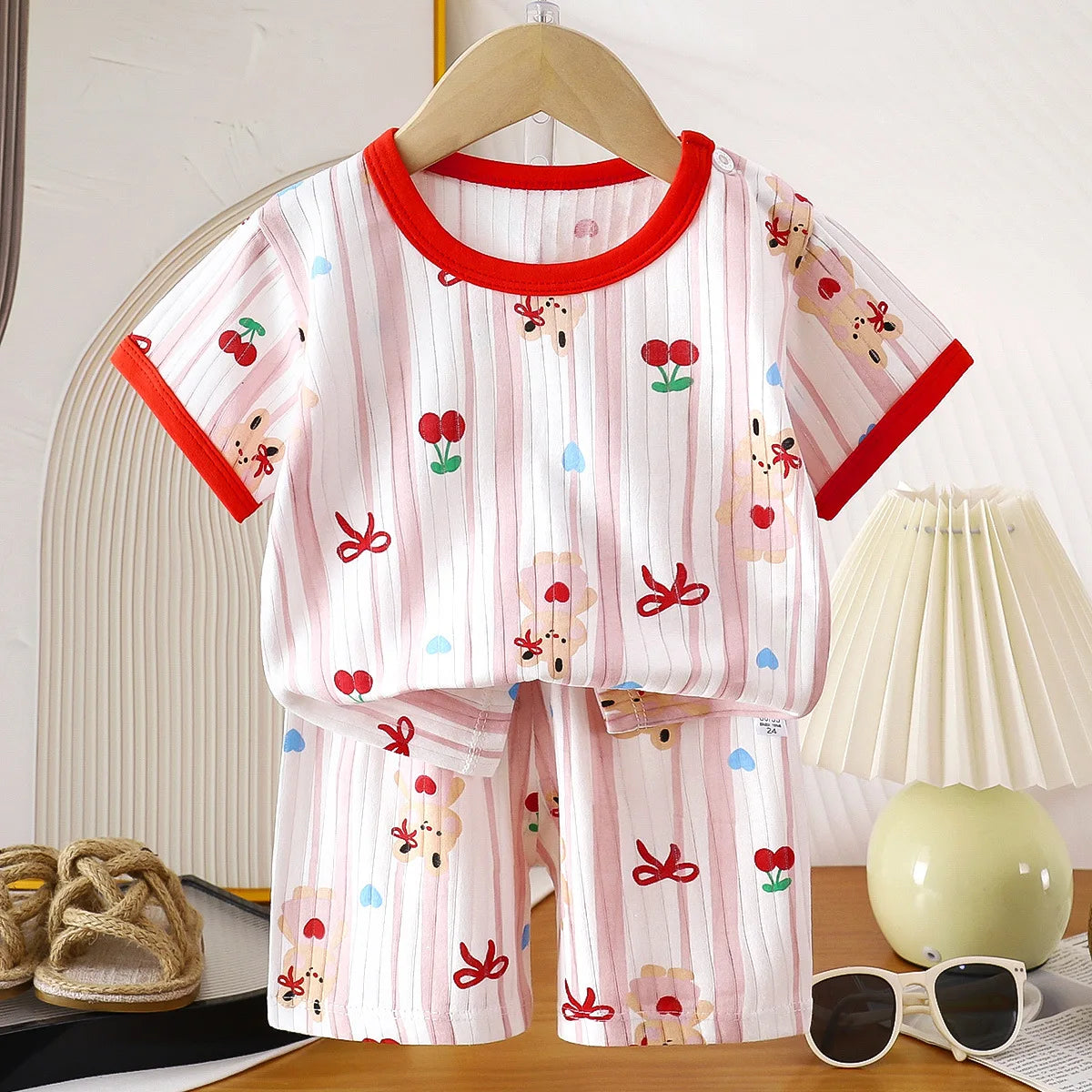 Children's summer clothing set with T-shirts, shorts, and baby boy and girl outfits by I YAN, made of cotton for comfort.