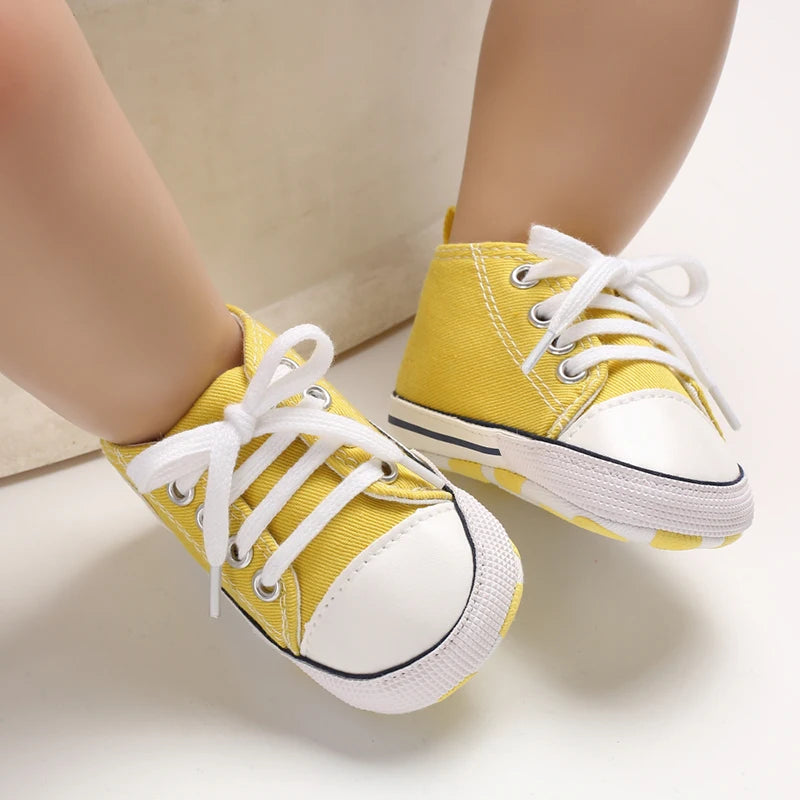 Baby boy and girl infant sneakers by I YAN, classic canvas anti-slip shoes with star design for first walkers and toddlers.