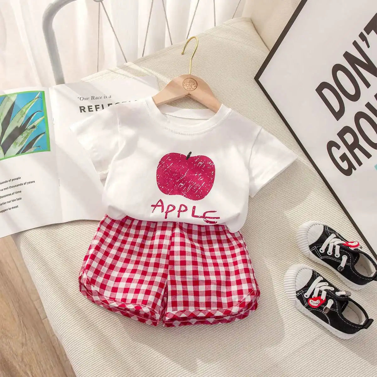 Children's 2-piece summer set with lemon and grape cartoon prints, includes short-sleeve top and plaid shorts by I YAN.