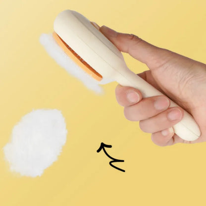 I YAN self-cleaning cat brush and pet hair remover with ergonomic handle, designed for easy grooming and hair removal.