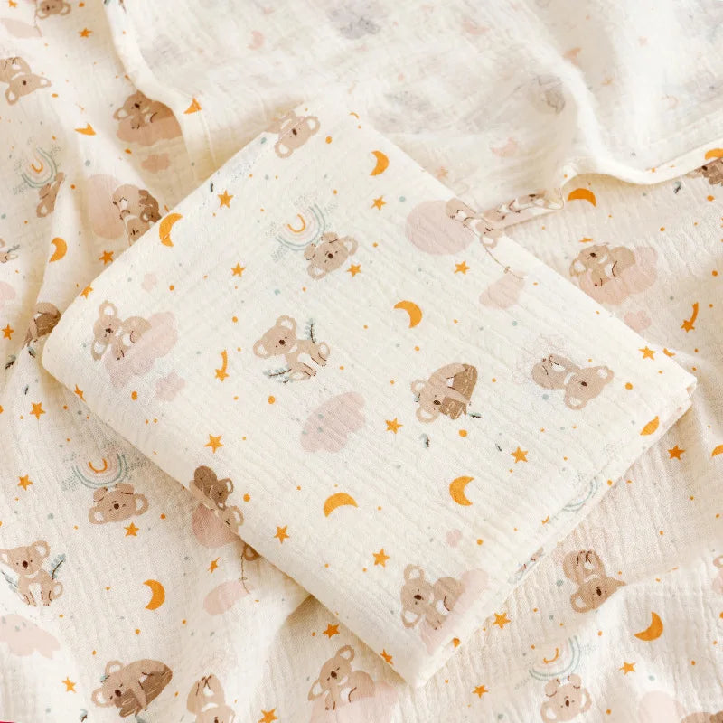 Soft, breathable cotton muslin baby swaddle blanket with cute cartoon print by I YAN, ideal for newborns and infants.