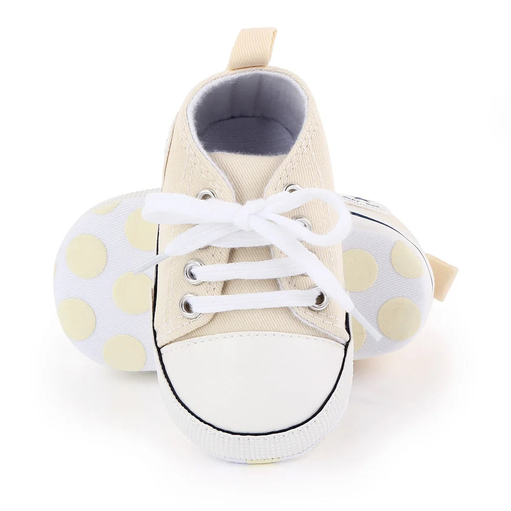 I YAN baby canvas sneakers for boys and girls with soft soles, non-slip grip, ideal for first walkers and toddlers.