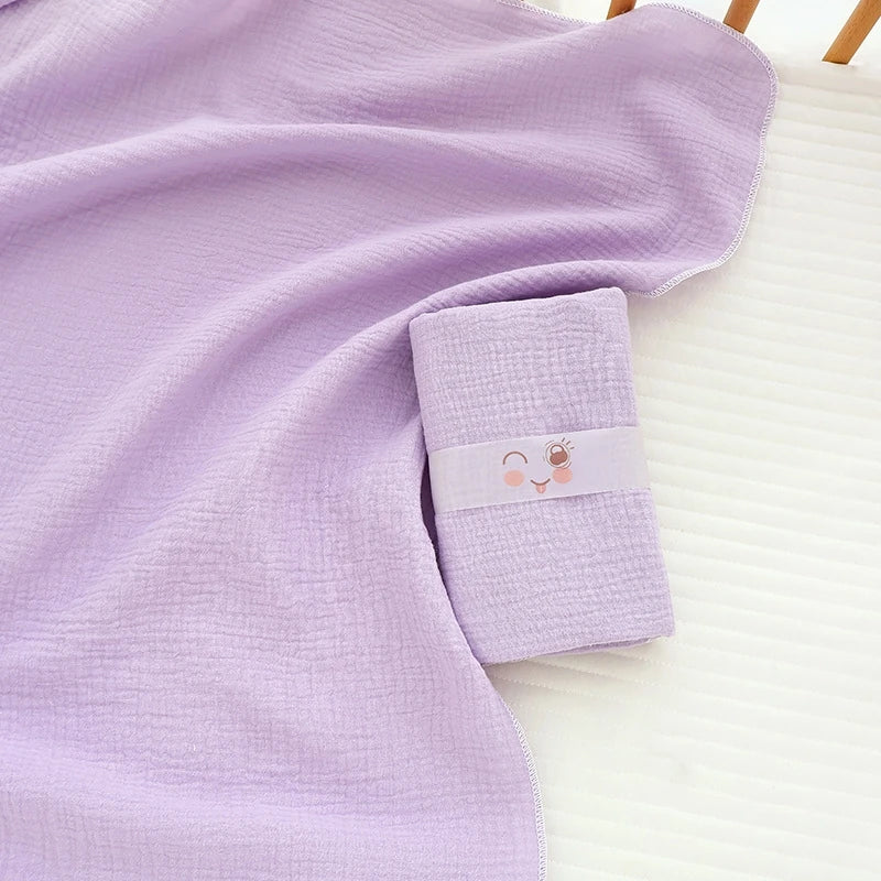 Soft cotton muslin baby swaddle blanket with cute cartoon print, breathable and gentle for newborns from I YAN.