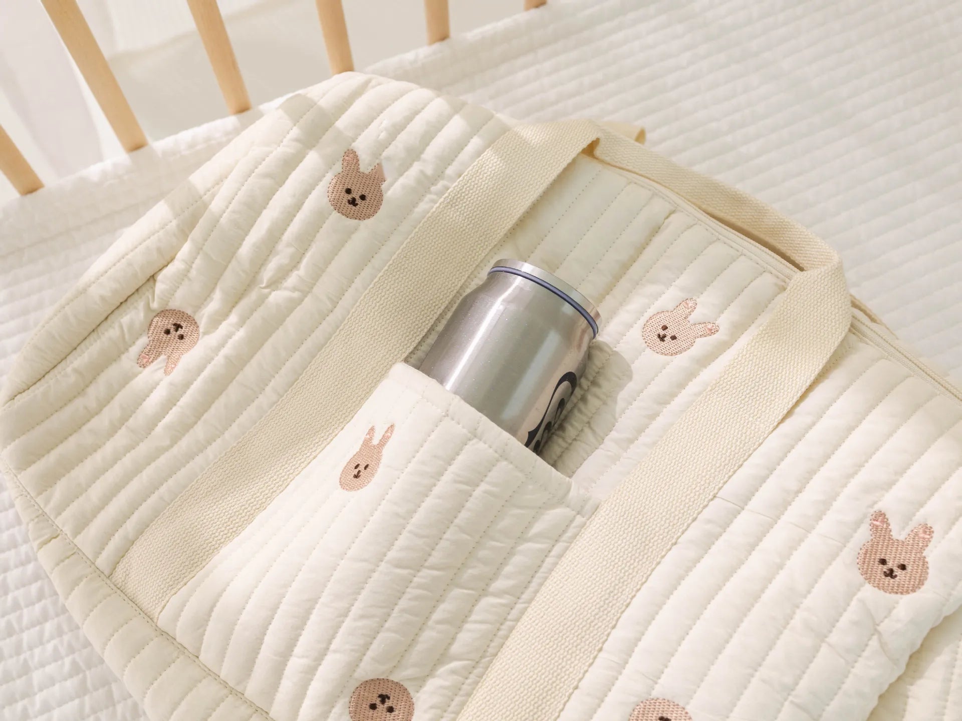 I YAN Mommy Bag Bear maternity diaper bag with stroller straps, multiple pockets, and changing pad for baby care on the go.