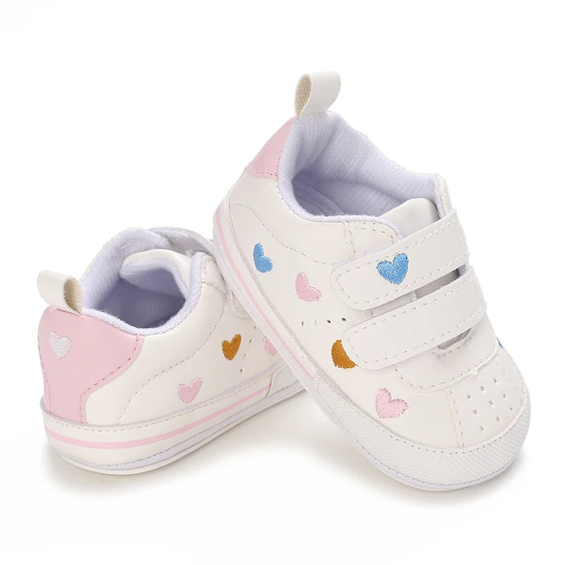 Cute pink baby girl crib shoes from I YAN with soft soles, ideal for first walkers and toddlers aged 0-18 months.
