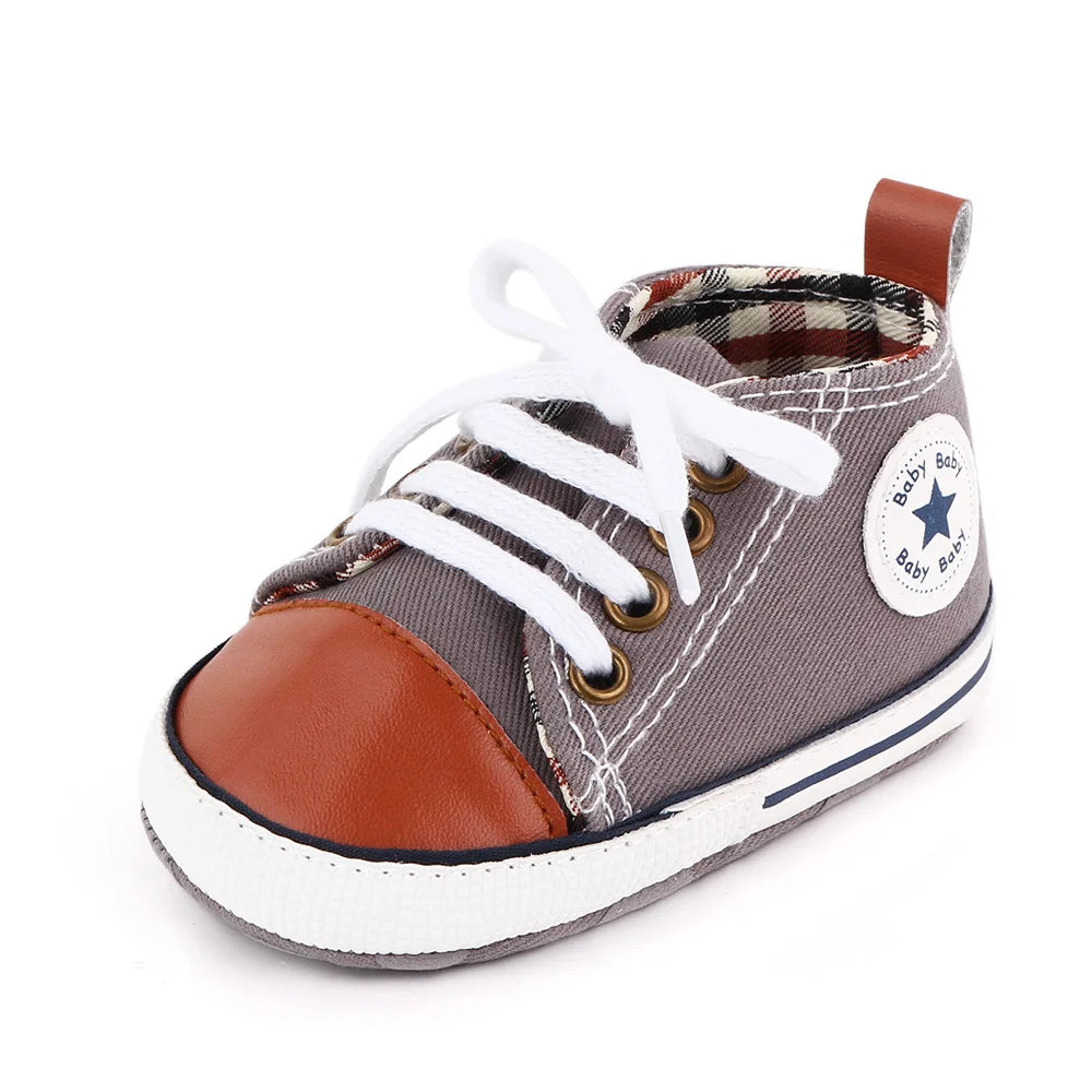 I YAN spring baby canvas sneakers for boys and girls with soft soles, non-slip design, ideal for newborns and toddlers learning to walk.