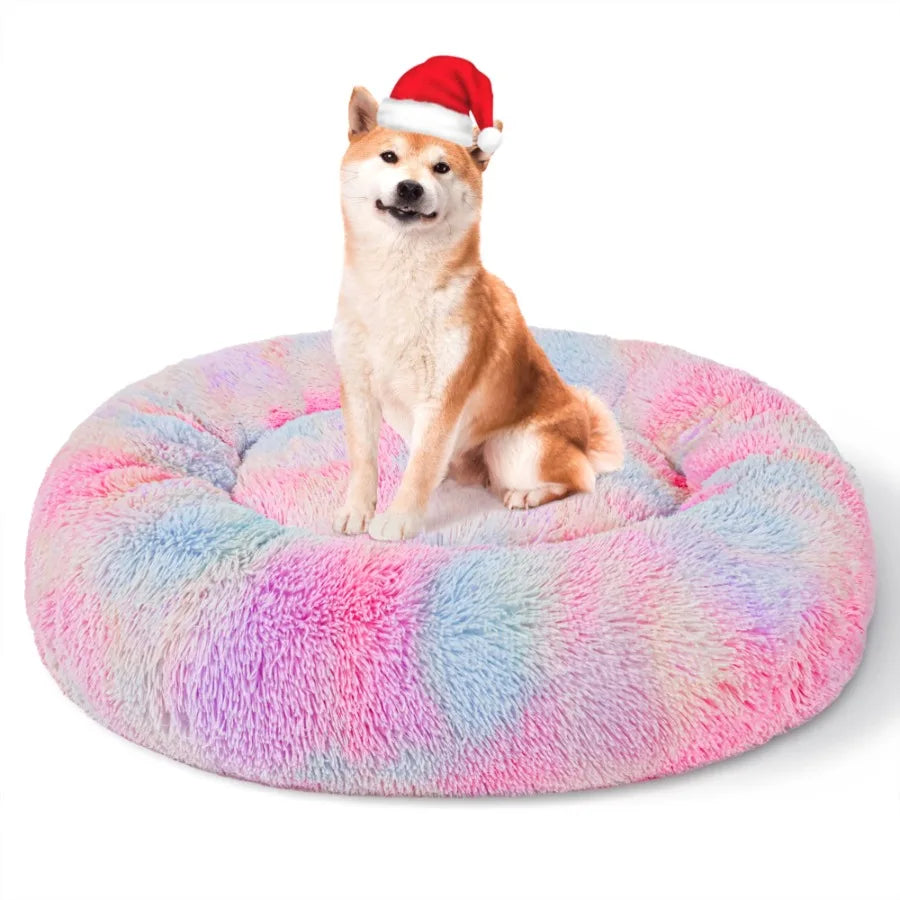 Pink rainbow plush Calming Donut Pet Bed for small dogs by I YAN, cozy, warming, anti-anxiety dog bed in 20-inch size.